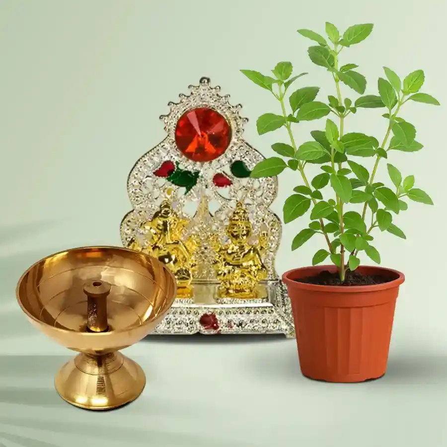 Divine Tulsi Diya and Mandap set featuring a brass diya, Tulsi plant, and Ganesh Laxmi idol in gold and silver finishes.