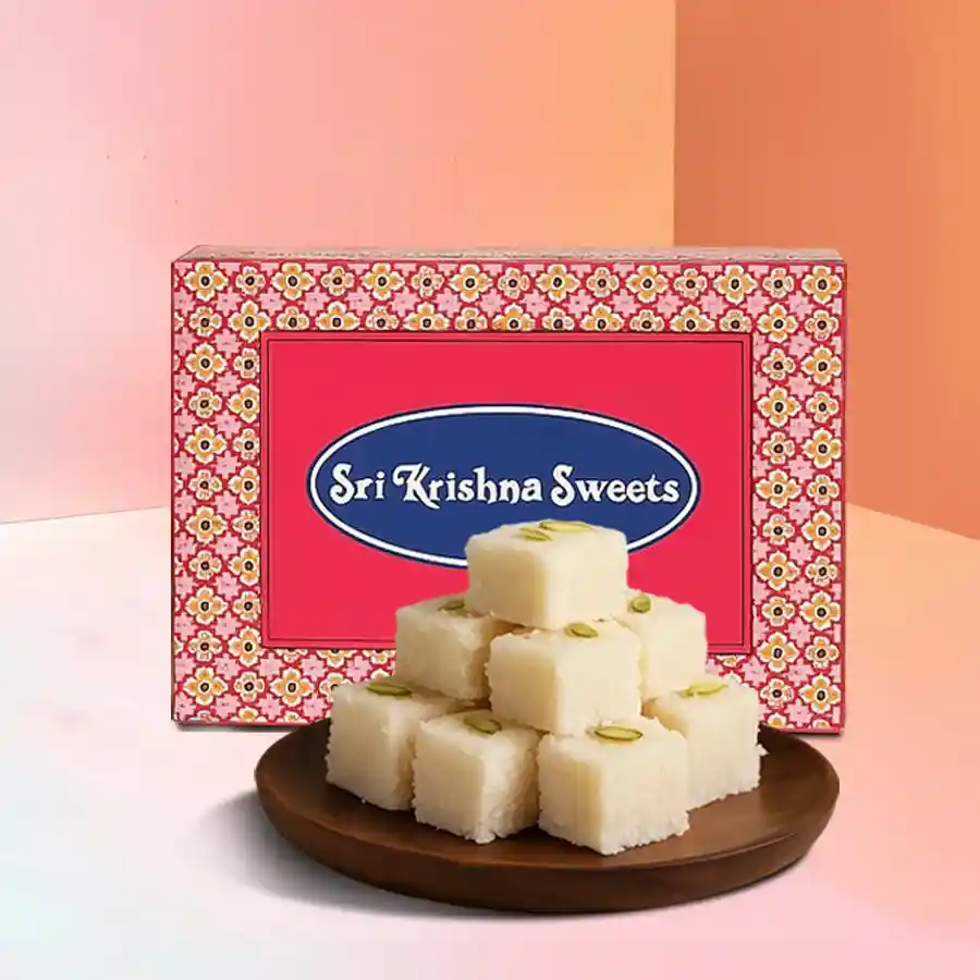 A 250g packet of Heavenly Coconut Barfi Treats, showcasing chewy coconut delights perfect for gifting and celebrations.