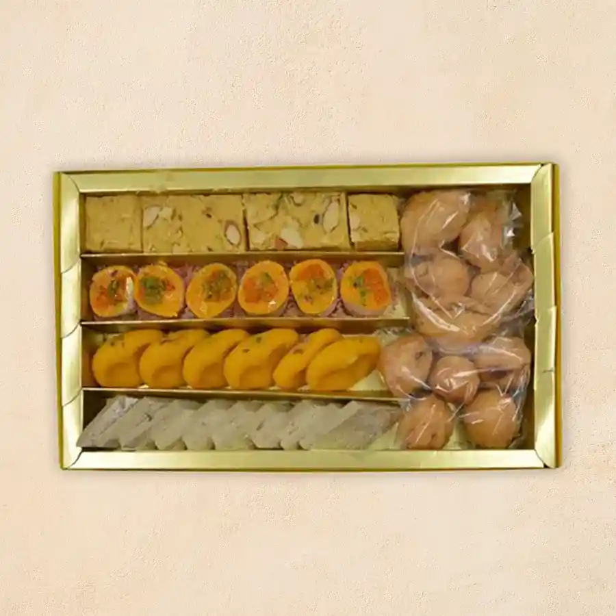 Sweet Moments Delight Box filled with delicious Indian sweets and snacks.