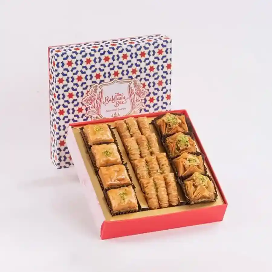 A beautifully arranged box of Red Imperial Assorted Baklava treats featuring flaky pastry and rich nut fillings.