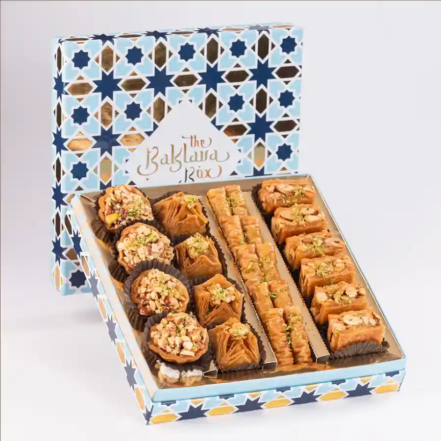 Blue Imperial Assorted Baklava Box showcasing layers of flaky pastry filled with nuts and syrup, presented as a beautiful gift hamper.