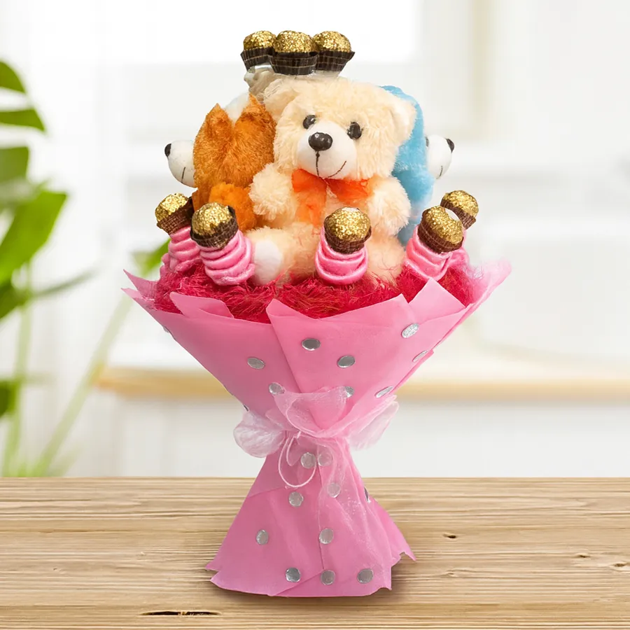 Delightful bouquet featuring 4 teddies and 12 Ferrero Rocher chocolates.