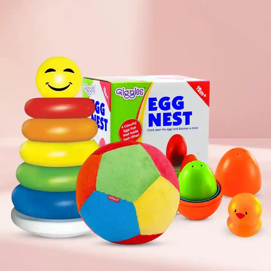 Colorful stacking ring set with soft ball and giggles nesting eggs for kids aged 0-2, designed for playful learning and coordination skills.