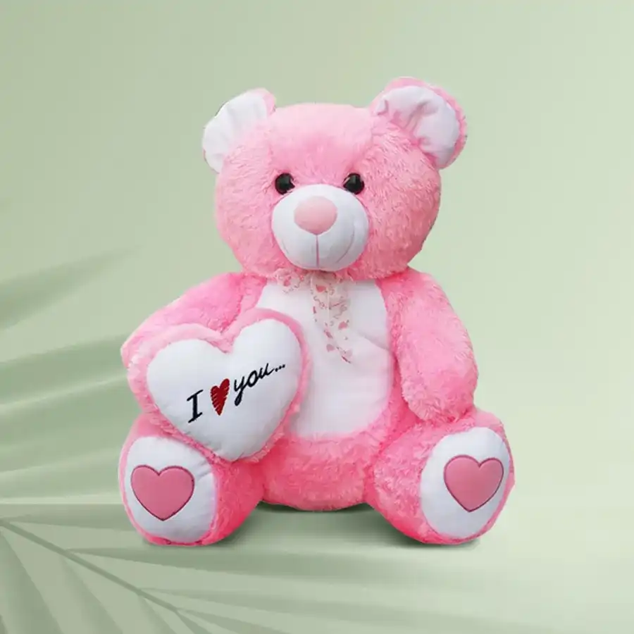 Heartfelt Cuddles Teddy, a plush companion with a heart-hugging pattern, perfect for gifting joy and affection.
