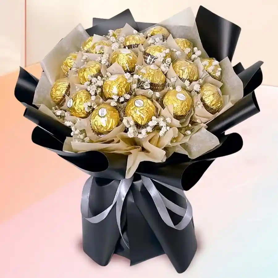 Bouquet featuring 16 Ferrero Rocher chocolates wrapped in elegant tissue.
