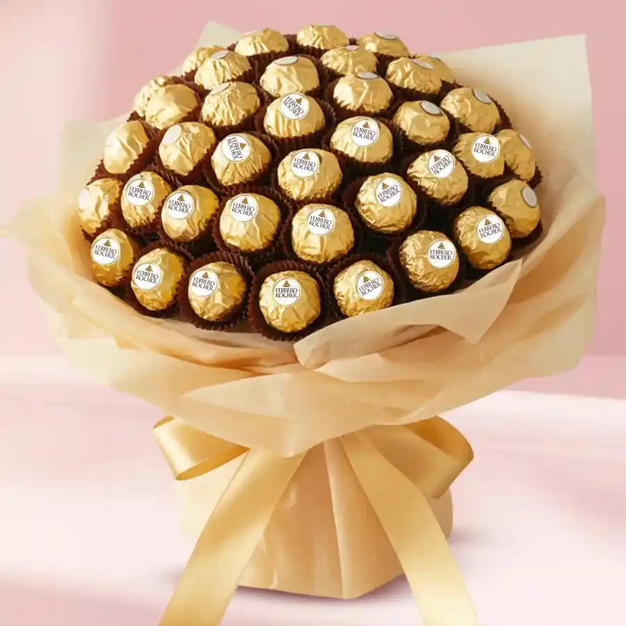 Beautiful Ferrero Rocher chocolate bouquet with 32 pieces, elegantly wrapped in tissue for birthdays.