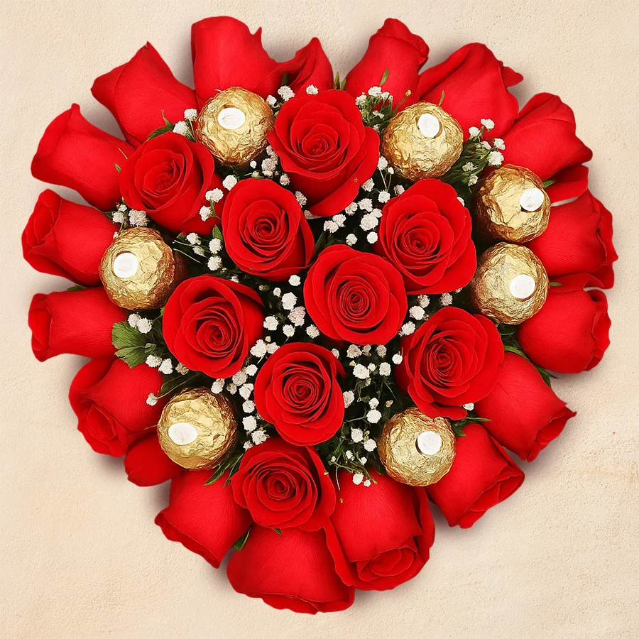 Heart-shaped arrangement featuring 24 red roses and 16 Ferrero Rocher chocolates, ideal for gifting on special occasions.