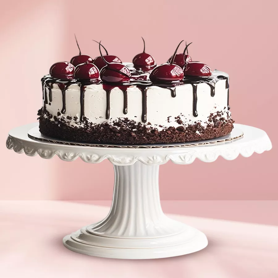 A tempting 1 lb Black Forest Delight Cake with chocolate layers, cream, and cherries, freshly baked for delivery in Chennai.