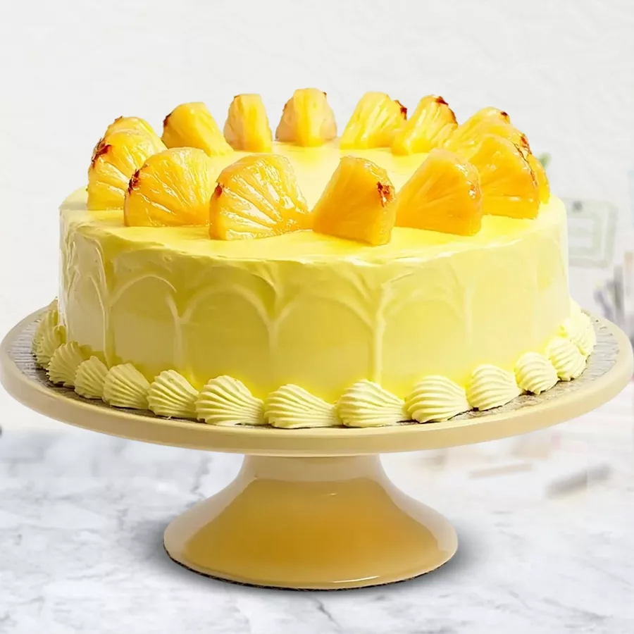 Tropical Pineapple Cake from 5 Star Bakery, weighing 2.2 lbs, showcasing moist cake and sweet pineapple filling.