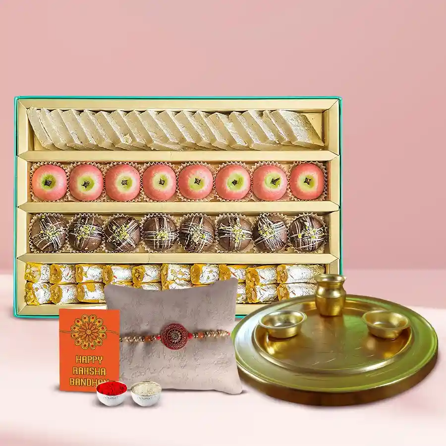 Impressive Stone Rakhi with Golden Rakhi Thali and assorted sweets for Raksha Bandhan celebration