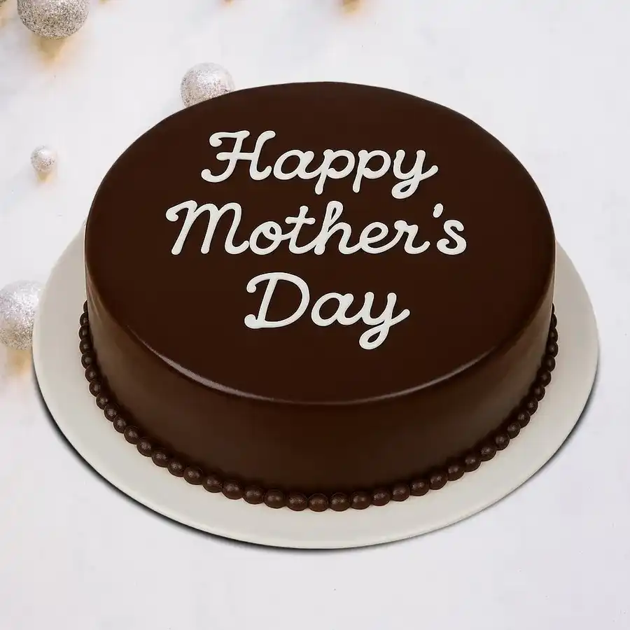 A round, Mother’s Day themed chocolate cake, perfect for celebrating mom.
