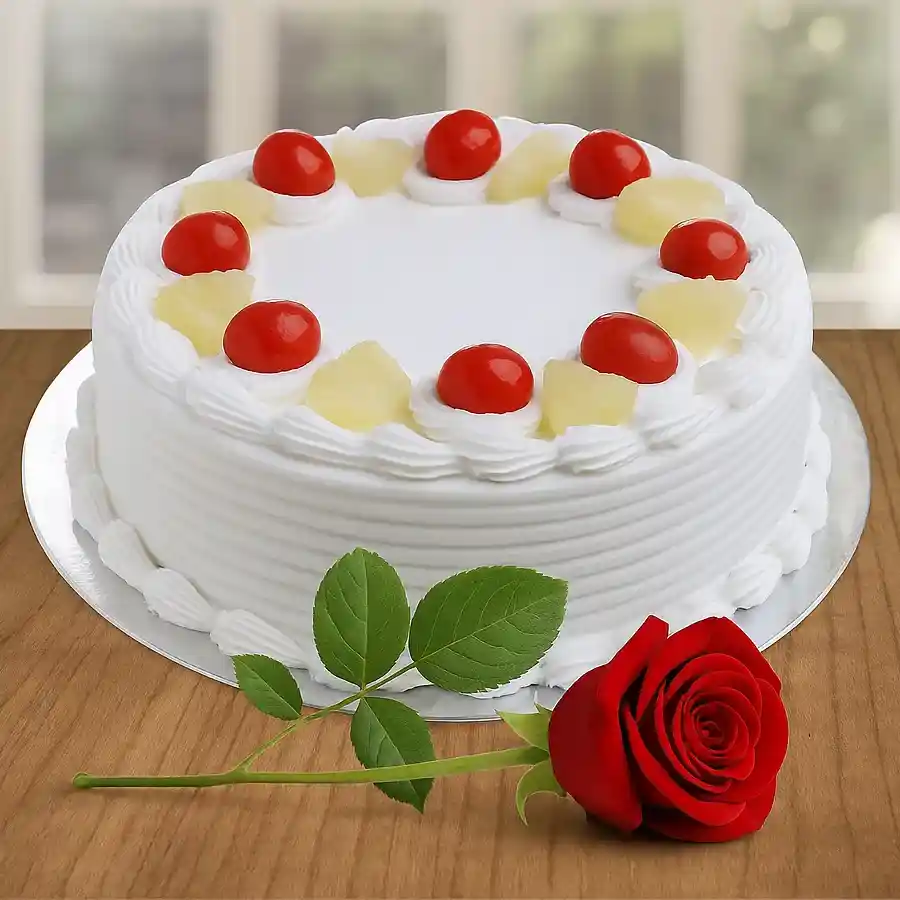 Fresh-baked 1 lb Vanilla Cake accompanied by a charming Red Rose for special celebrations.