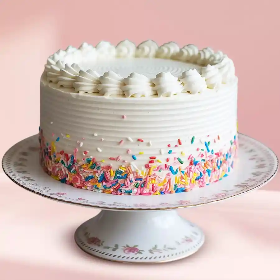 A beautifully presented 1 lb Enchanting Vanilla Cake from 3/4 Star Bakery, perfect for gifting on special occasions.