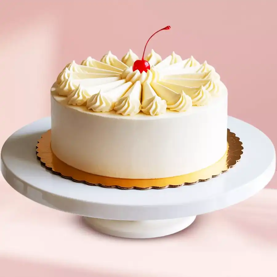 A beautifully crafted 2 Kg Vanilla Cake from 3/4 Star Bakery, perfect for gifting and sharing at celebrations.