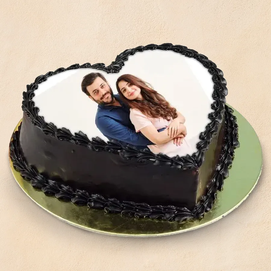 A personalized 500 gms Chocolate Photo Cake ready for celebration with an edible photo on top.