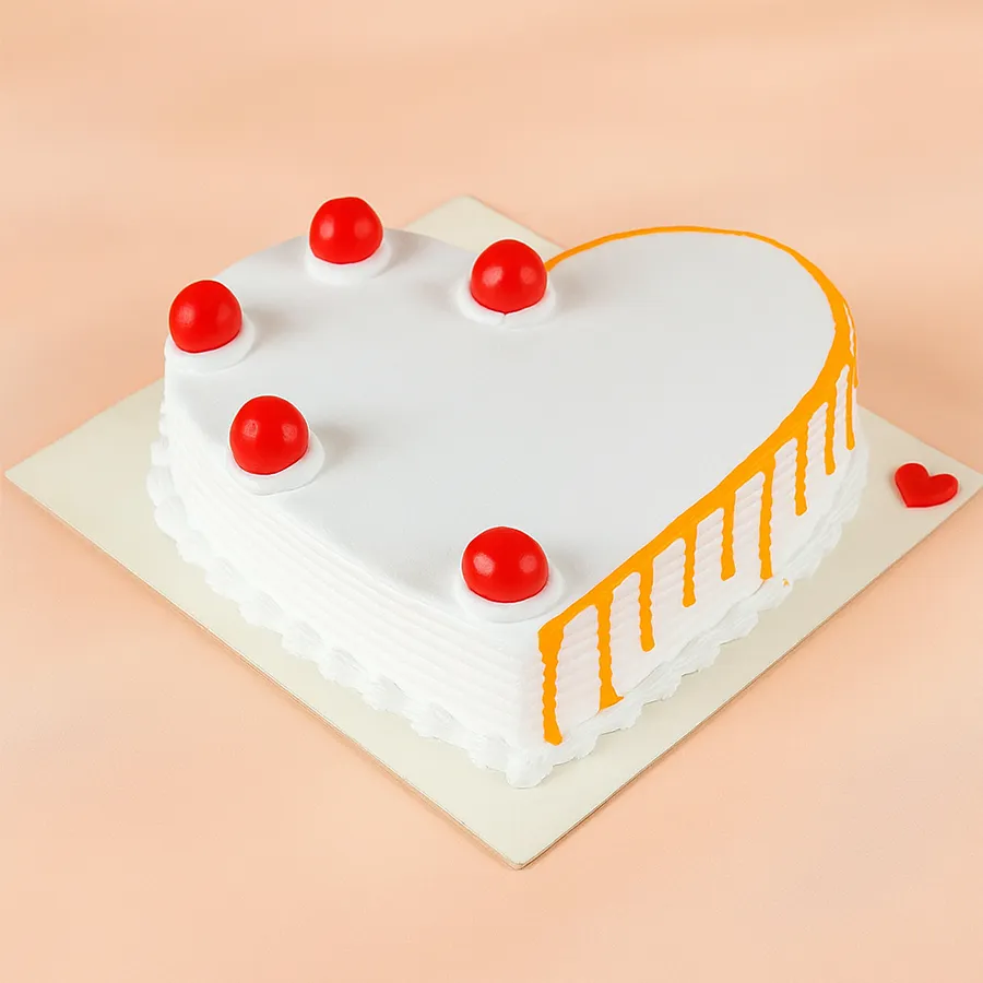 Heart-shaped vanilla cake weighing 500 grams, perfect for expressing love across distances.