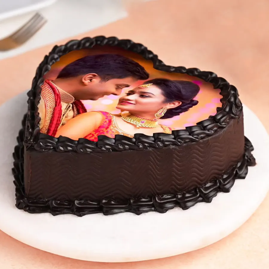 Heart-shaped chocolate photo cake designed for a heartfelt celebration.