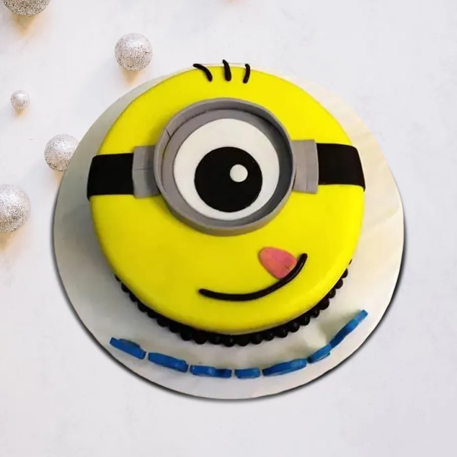Whimsical one-eyed Minions fondant cake for kids weighing 500 grams.