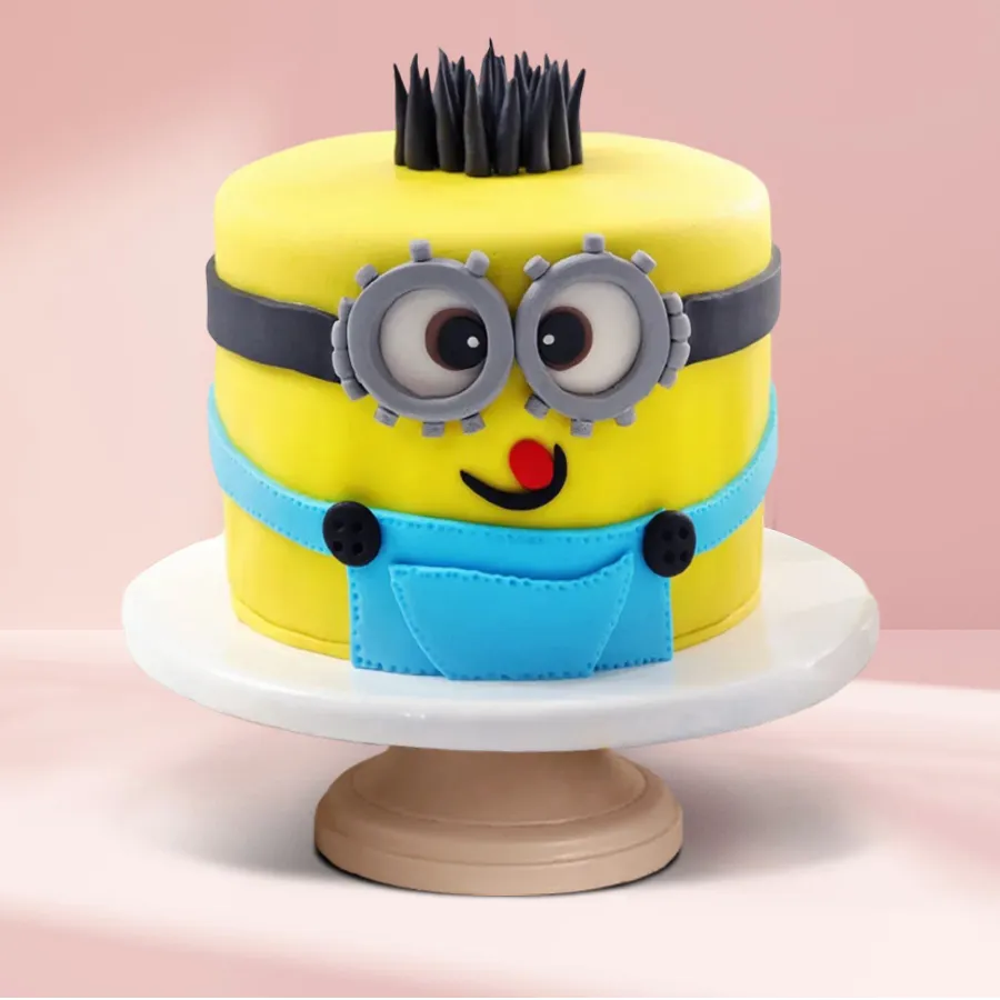 A cheerful Minions Fondent Cake designed for kids, weighing 500 grams and decorated with vibrant Minion characters.