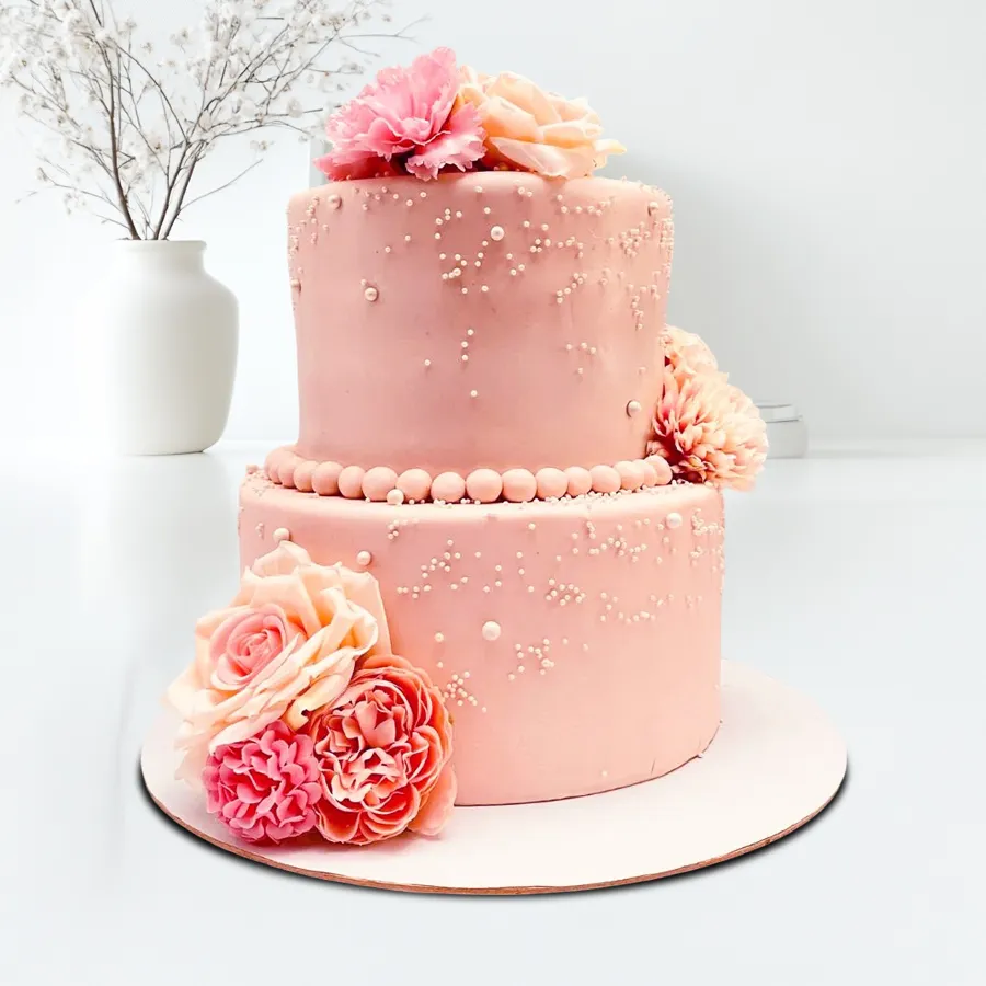 Heartfelt double-tiered wedding cake, weighing 5 kg, symbolizing love and celebration.