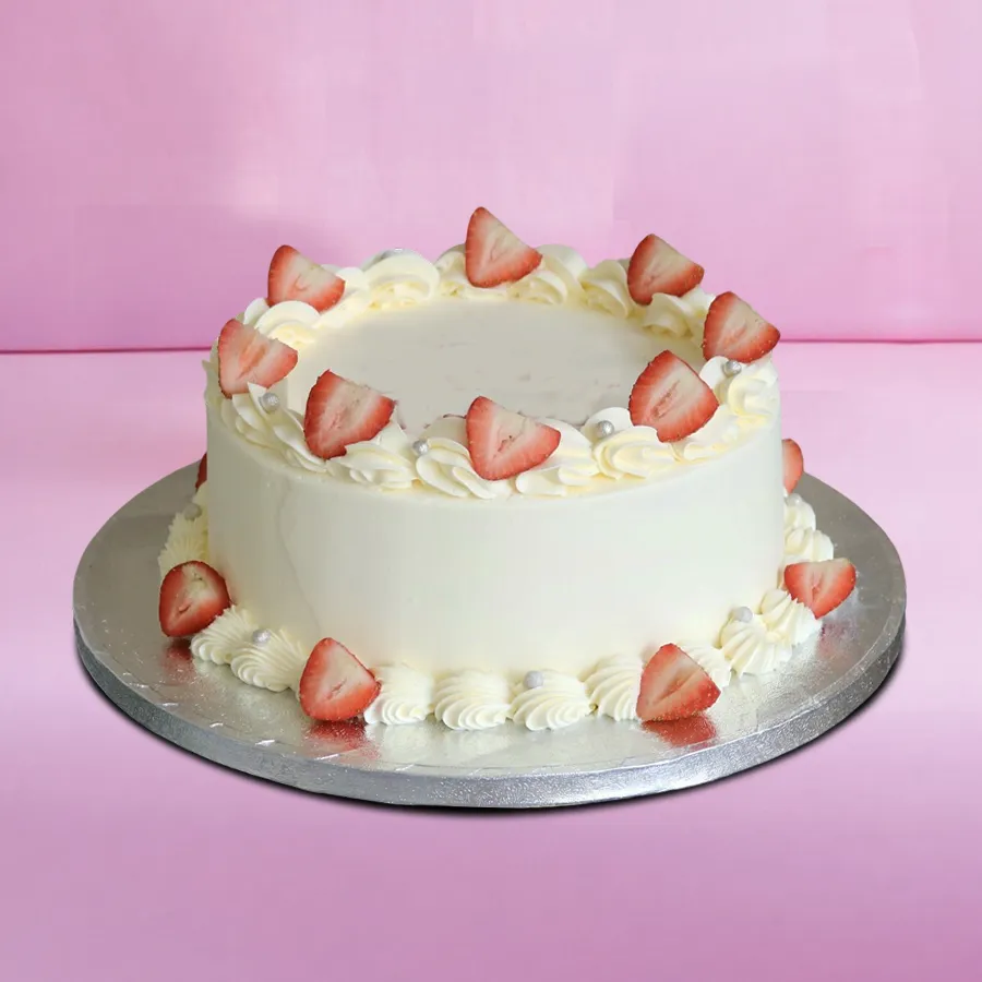 A whimsical strawberry birthday cake designed to create cherished memories, weighing 1 lb featuring a burst of fresh strawberry flavor.