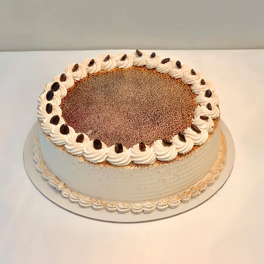 A beautifully presented Joyful Coffee Cake, perfect for indulgence and sharing, featuring rich flavors and a delightful aroma.