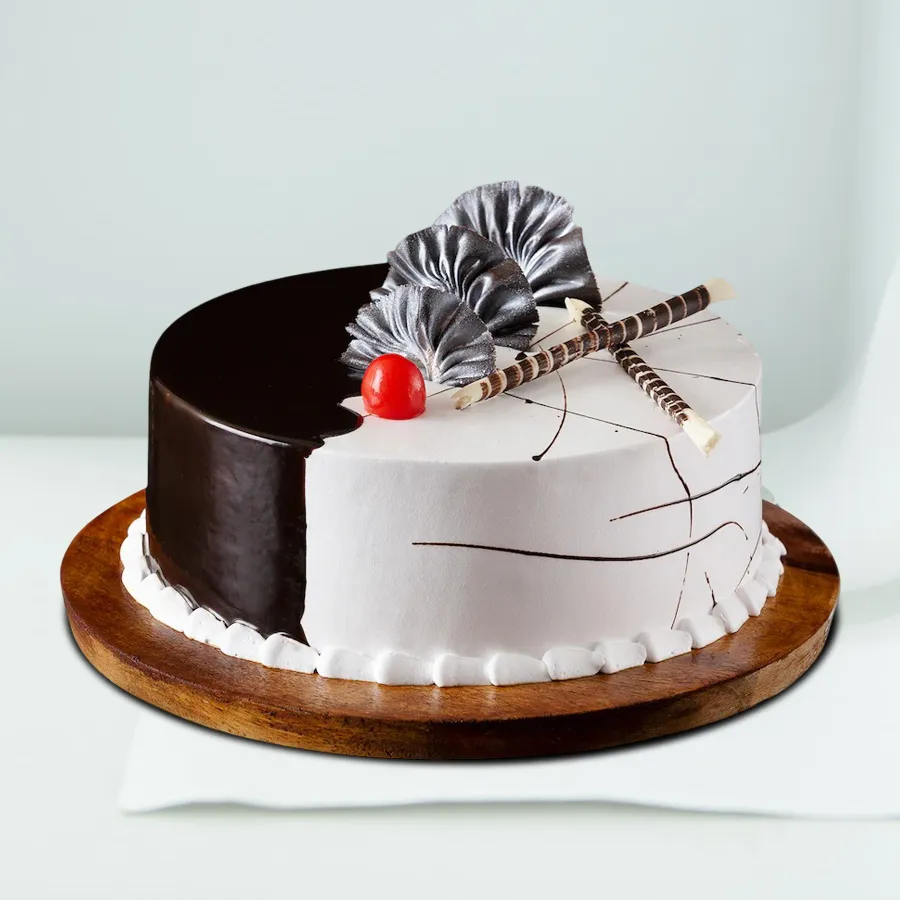 A beautifully layered Divine Chocolate-Vanilla Delight cake, perfect for sharing love and joy.