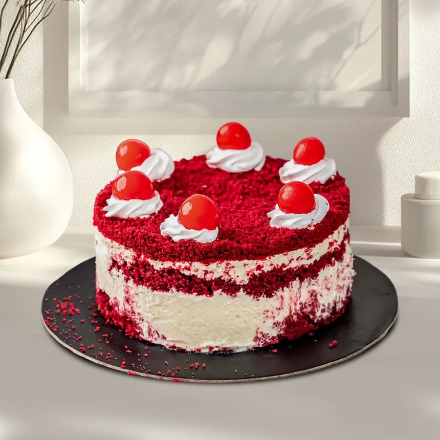 A 1 lb Red Velvet Cake, beautifully decorated, perfect for celebrations and gifting to loved ones.