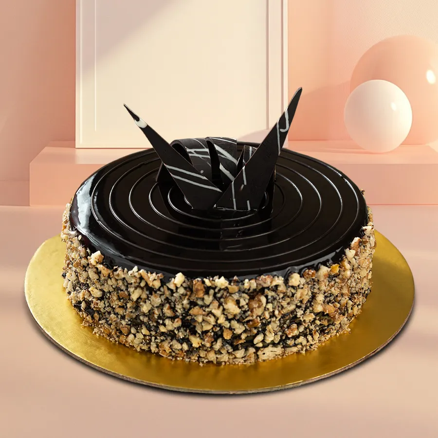 A beautifully decorated Walnut Cake, perfect for sharing special moments.