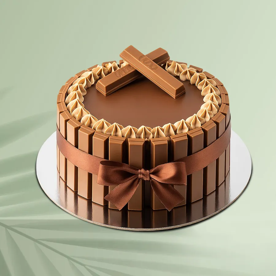 A beautifully decorated 1/2 kg Kitkat Cake, exuding joy and love, perfect for special occasions.