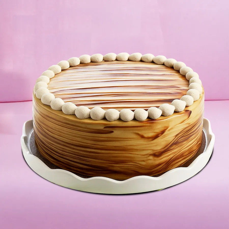 A mouthwatering 1/2 kg Yummy Coffee Mania Cake, perfect for gifting to coffee lovers.
