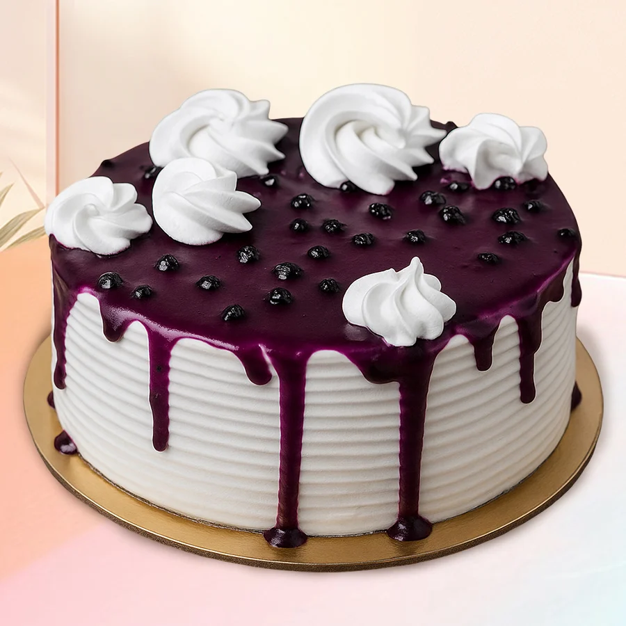 A beautifully crafted 1/2 kg Premium Blueberry Cake, designed for joyous occasions and sharing with loved ones.