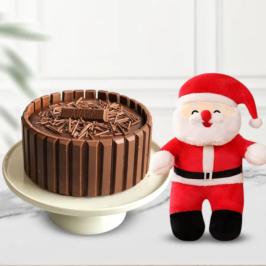 Kitkat Cake and a Santa Claus soft toy for Christmas celebration.