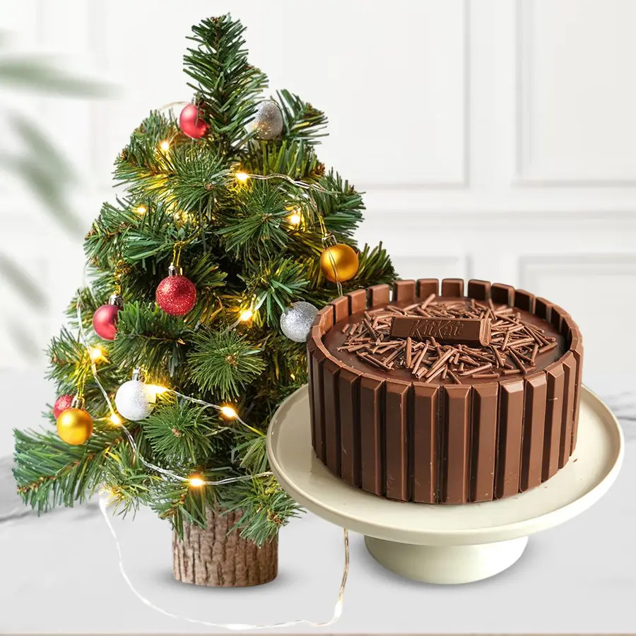 Wholesome KitKat Cake with a festive Xmas tree on top, perfect for holiday gifting.