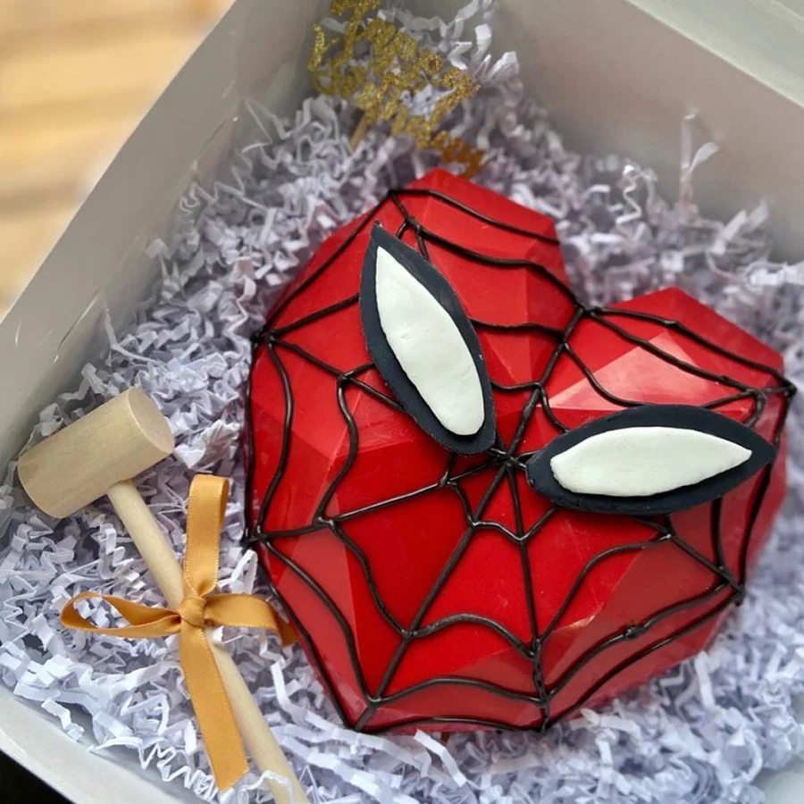 A vibrant Spider-Man Hammer Cake, perfect for special occasions, weighing 1 kg, designed to bring joy and delight to celebrations.