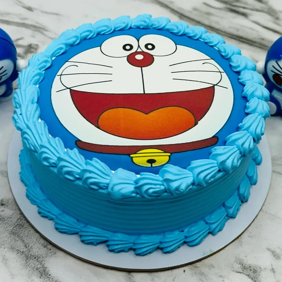 Doremon Delight Birthday Cake designed for kids' celebrations, featuring playful colors and a whimsical theme.
