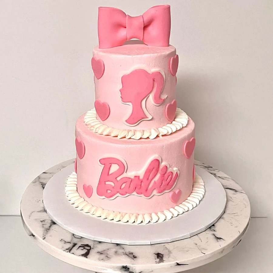 A dazzling 2 Tier Barbie Birthday Special Cake, beautifully decorated for celebrations, weighing 4 kg and designed to delight children and adults alike.