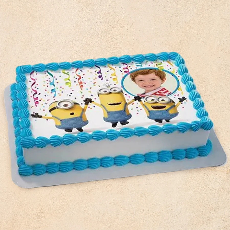 Customized Minion-themed cake for kids, weighing 2.2 lbs, featuring vibrant decorations and a personalized photo option.