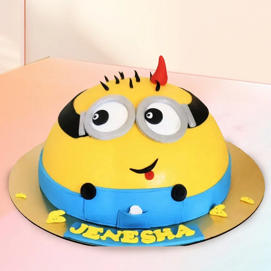 Garnished Minion Smash Cake with a hammer for birthday celebrations