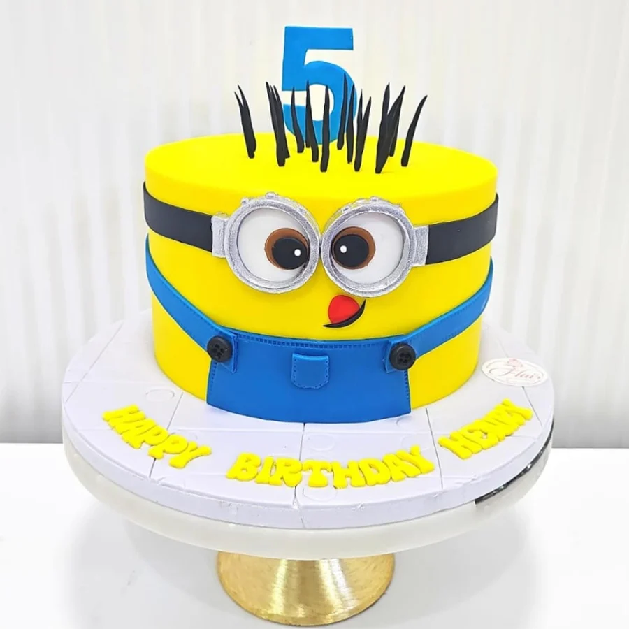 Two tier Minion-themed cake for kids, weighing 5 kg, perfect for celebrations.