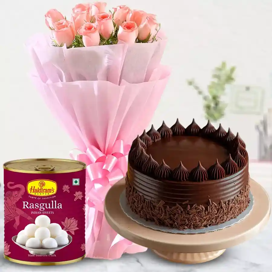Mother's Day combo of pink roses, Haldiram Rasgulla, and eggless chocolate cake.