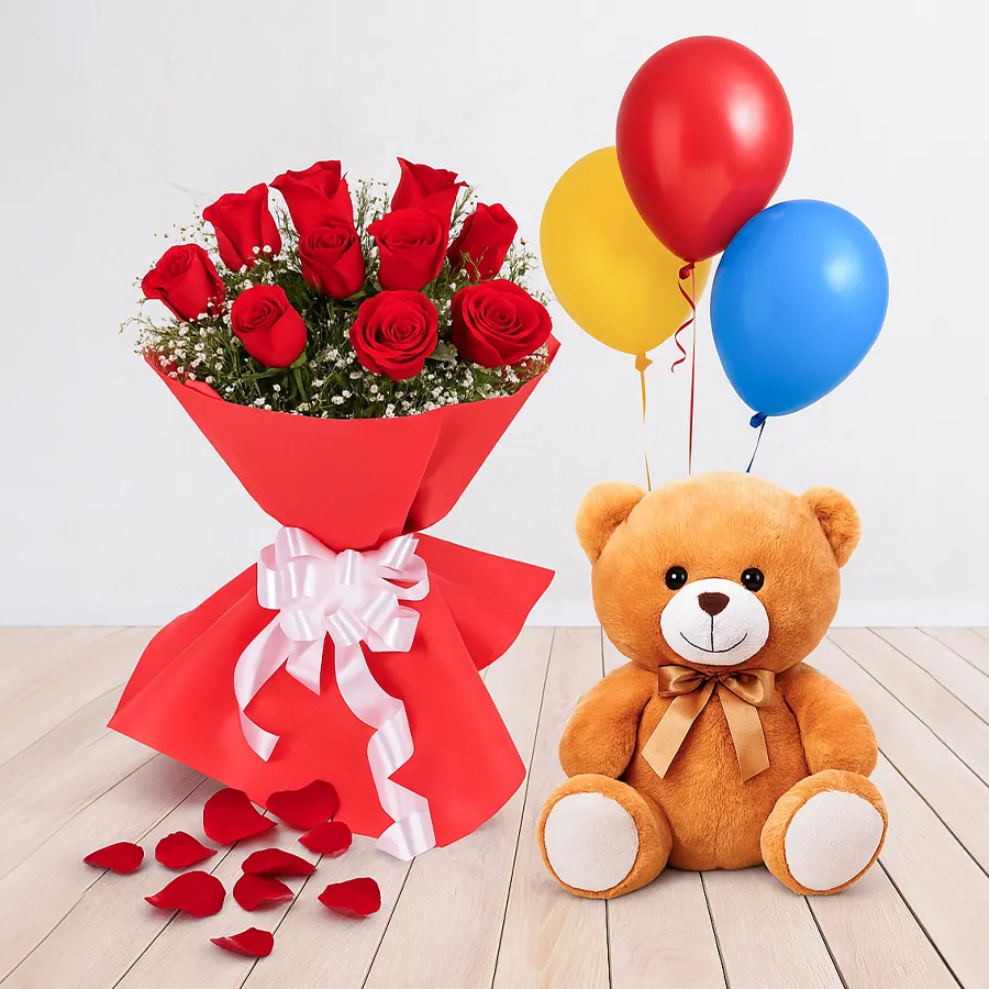 Gift combo featuring a bouquet of 12 red roses, an 8-inch teddy bear, and three colorful balloons celebrating joy and affection.