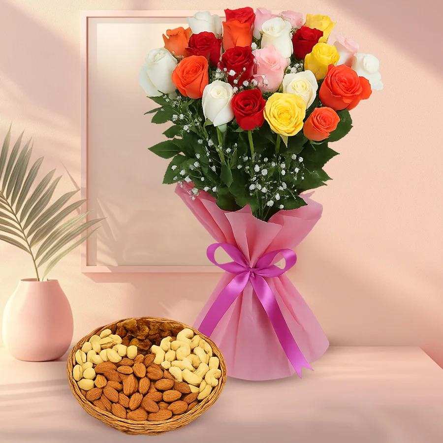 A vibrant bouquet of 24 mixed roses alongside 500g of assorted dry fruits including almonds, pistachios, raisins, and cashews.