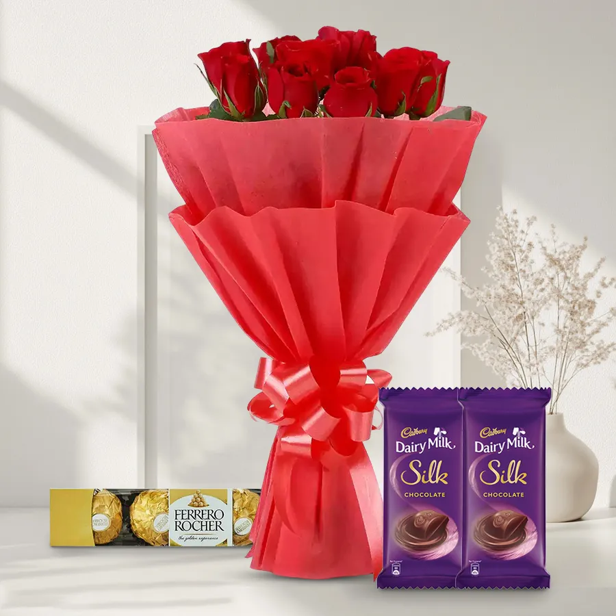 Gift set featuring 10 red roses, Ferrero Rocher chocolates, and Dairy Milk Silk for a romantic occasion.