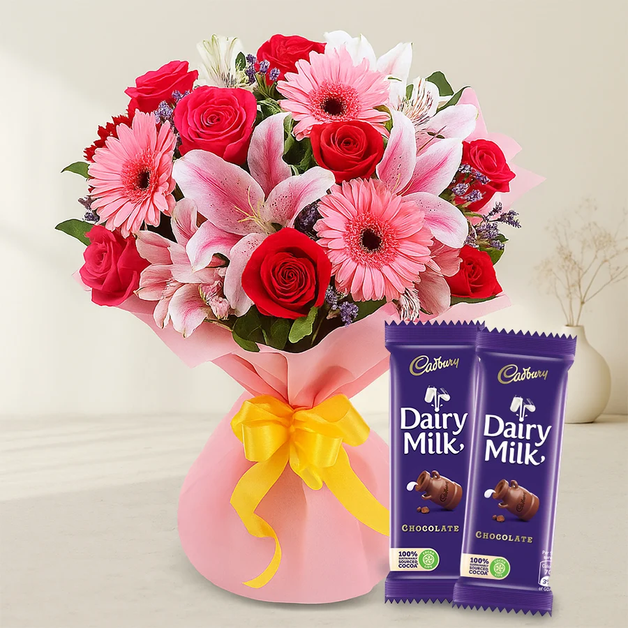 A vibrant bouquet of mixed flowers with Cadbury chocolates, perfect for gifting.