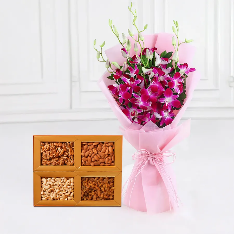 Exotic Orchid and Nut gift combo featuring 8 orchids and 500g of dry fruits, perfect for anniversaries and special occasions.