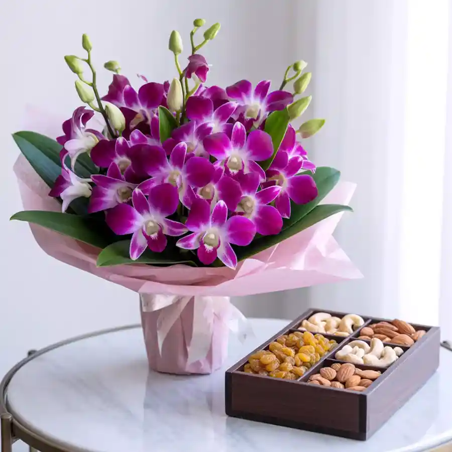 Elegant Orchids Bouquet with 500 grams of assorted dry fruits.