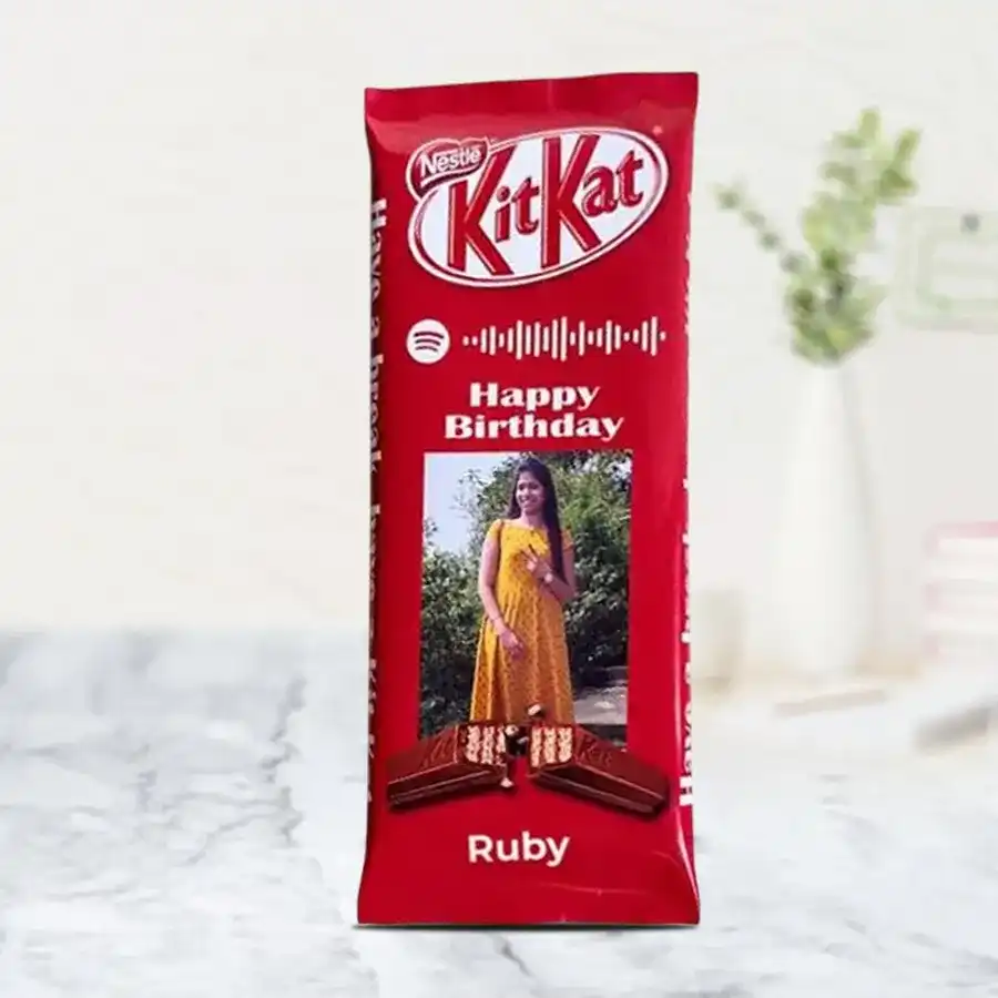 Personalized Musical Nestlé KitKat Bar with a Spotify song, adorned with a digital photo.