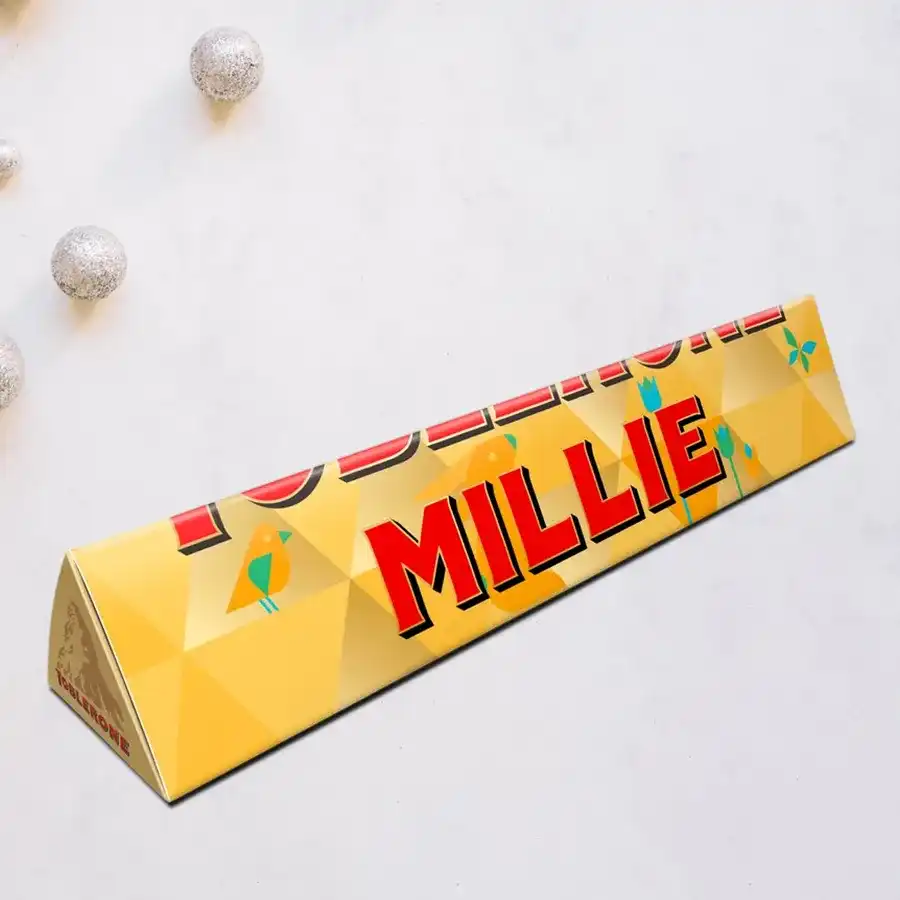 Personalized Swiss Toblerone chocolate bar with a customized name on the wrapper