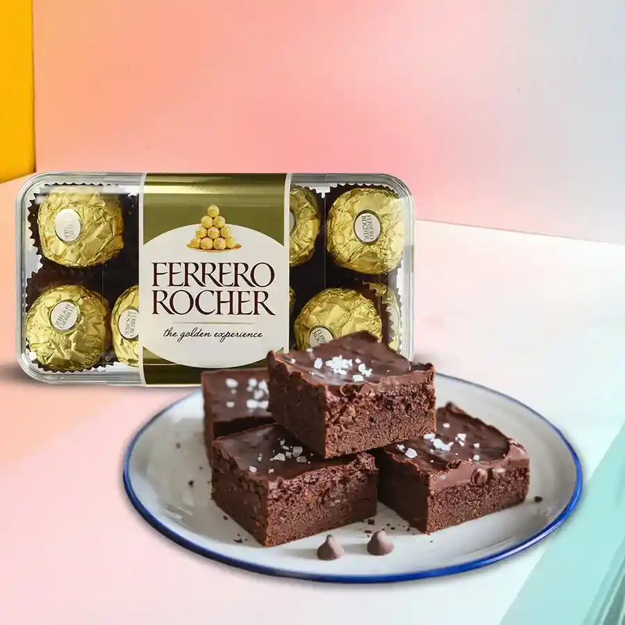 Delicious brownies accompanied by Ferrero Rocher chocolates for a delightful gift.